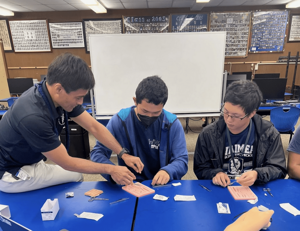 suturing workshop with high school students